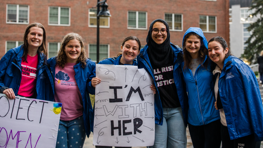 Student organizers pose for a photo