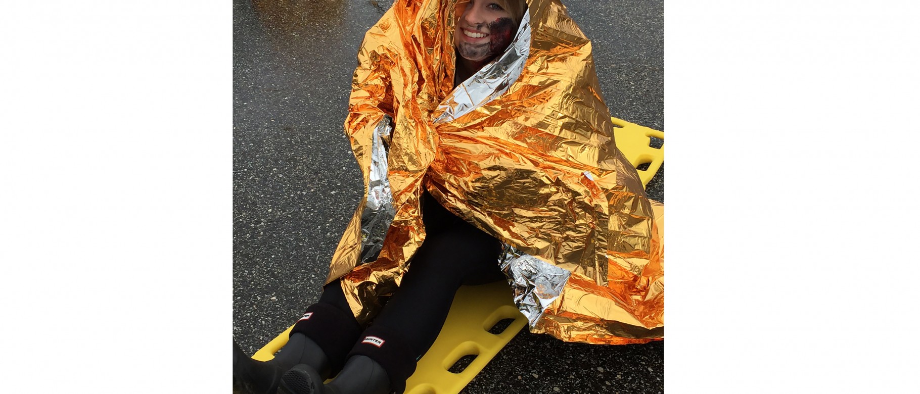 UNE Nursing student Lydia Rice '18 poses for a photo while participating in a disaster drill