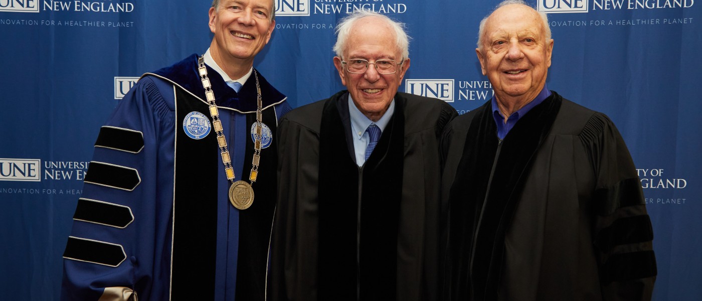 UNE President James Herbert poses with Bernie Sanders and Art Girard