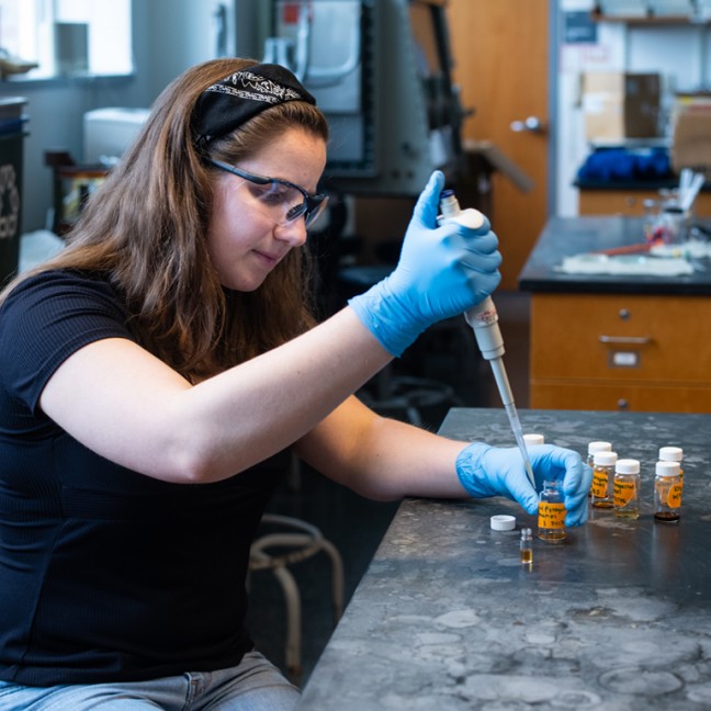 a student works in a chemistry lab