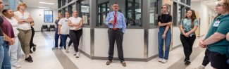 UNE students get a tour of the Maine Correctional Center's medical wing.